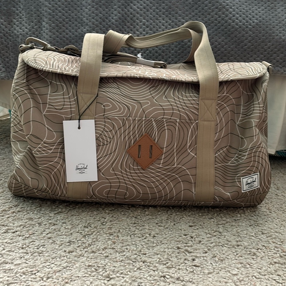 NWT Herschel Heritage Duffle in green twill topography 40L